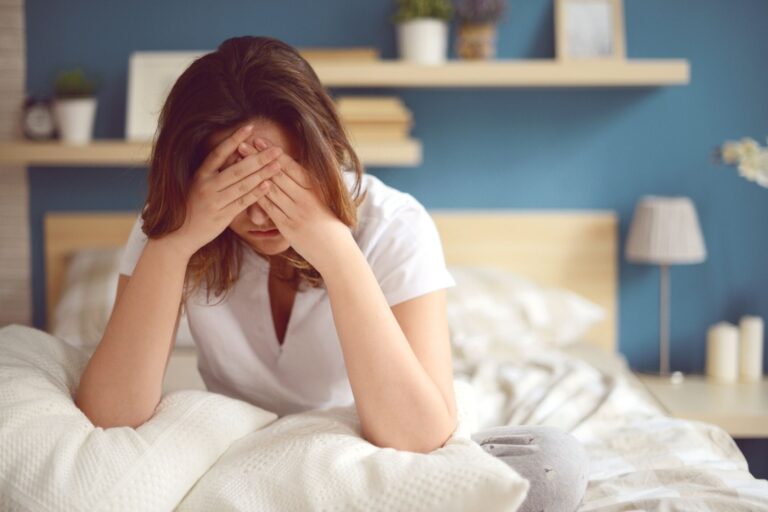 unhappy girl in bedroom